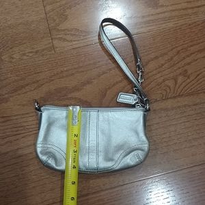 Silver genuine leather Coach wristlet